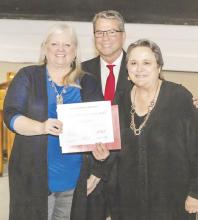 Texas Sen. Charles Perry presented the Texas Historical Commission’s Texas Treasure Business Award to Barbara Brannon (left), editor, and Kay Ellington, publisher of The Texas Spur, which has operated continuously in Dickens County since 1909. (Texas Spur photo by Fred Cervantes)