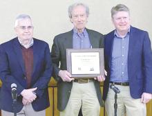Uvalde Leader-News Publisher Craig Garnett (center) accepted the Tom and Pat Gish Award from the Institute for Rural Journalism, represented by Al Cross, (left) director emeritus, and Benjy Hamm, director, during the recent symposium Celebrating Courage, Tenacity, Integrity and Innovation in Rural Journalism at UT Austin.
